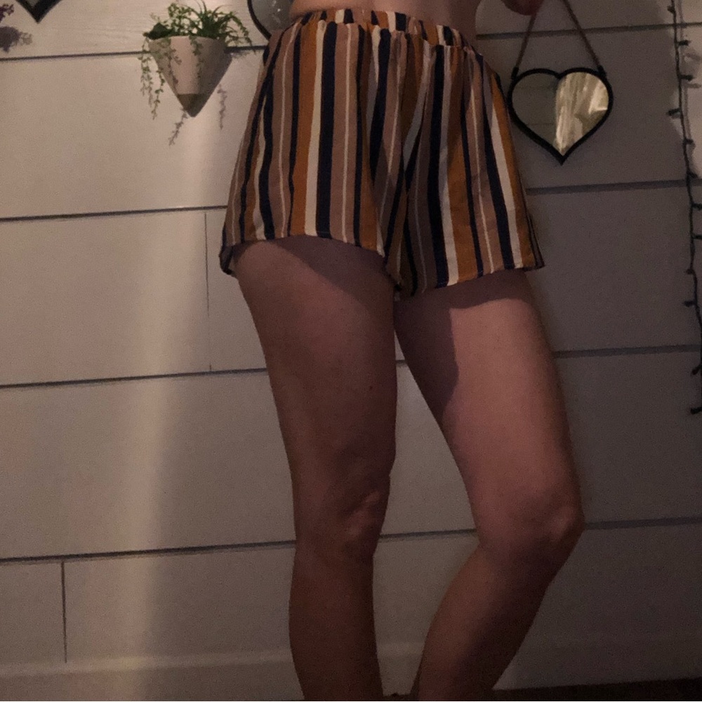 Multi color striped shorts. Size medium